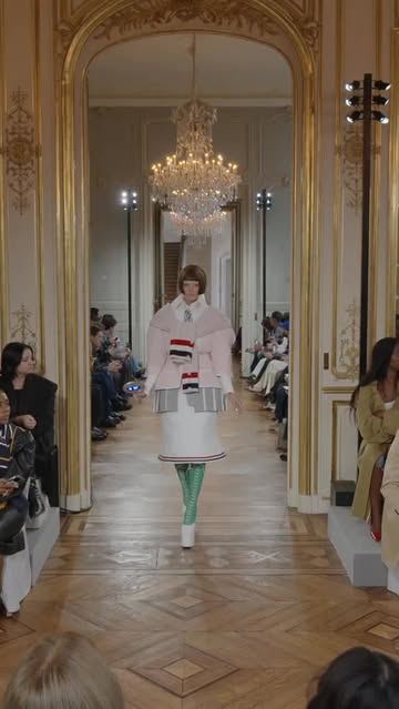 … beam me up … 
thom browne spring 2026 collection. 

daria wears an oversized modular nipped-waist tailored jacket in pink cotton crepe with white tipping and wraparound pink cashmere knit sleeves with red, white and blue cricketing and a pleated skirt in grey solid tweed over a nipped-waist polo dress in white satin ribbon tweed. daria walks in teviot platform shoes with saddle boot covers in green and white nubuck.

yelibe wears a box-pleated raglan overcoat in pink double duchess embroidered with frayed organza and grosgrain stripes over a sculpted shoulder cropped jacket in grey solid tweed with white grosgrain tipping paired with a low-rise bermuda pleated skirt in grey piece-dyed seersucker with white grosgrain tipping and silk inserts and trompe l’oeil 4-bar sandal boots in yellow suede & navy patent leather.
 
marina wears an intarsia mini dress in white cotton seersucker with a red cotton crepe polo neck, grey cotton crepe pleated skirt and pink solid tweed sweater with 105mm hector 4-bar boots in green nubuck and pink suede.

skincare @isclinical
#thombrowne #thombrowness26