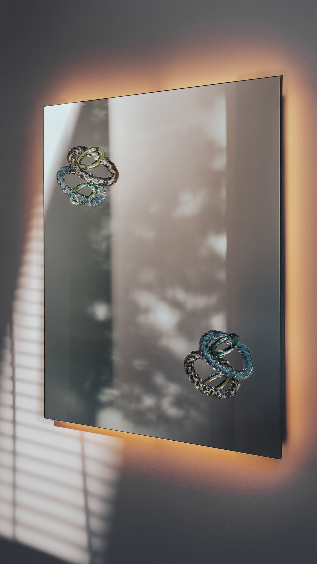 Shadow Play

Hooptical 
by Bethan Laura Wood

Luminous rings hover, seemingly suspended in space.
Coloured glass elements intersect and align in a quiet choreography of precision and light.

#Cassina #Hoopticalmirror #BethanLauraWood