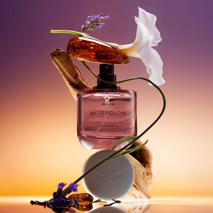 Revealed 🚨 NEW! #Fragrance 💜🧡 #Afterglow Eau de Parfum with Amber #phlur 

Inspired by the spark of a first connection. The kind that lingers in the air like static. It’s warm and alive, a mix of anticipation and ease.
1.7oz $99 / 0.32oz $32

Woody amber fragrance 
Top: citrus splash, apricot skin, coconut foam 
Heart: lavender milk, ambrette, vanilla planifolia
Base: sandalwood, ambrox, cashmere woods

Will be available ➡️ December 7 on their website Sephora 
 LINK in BIO 

Is it on your list? 💜🧡XO #TRENDMOOD #fragrancetok 
https://bit.ly/4p0NAay