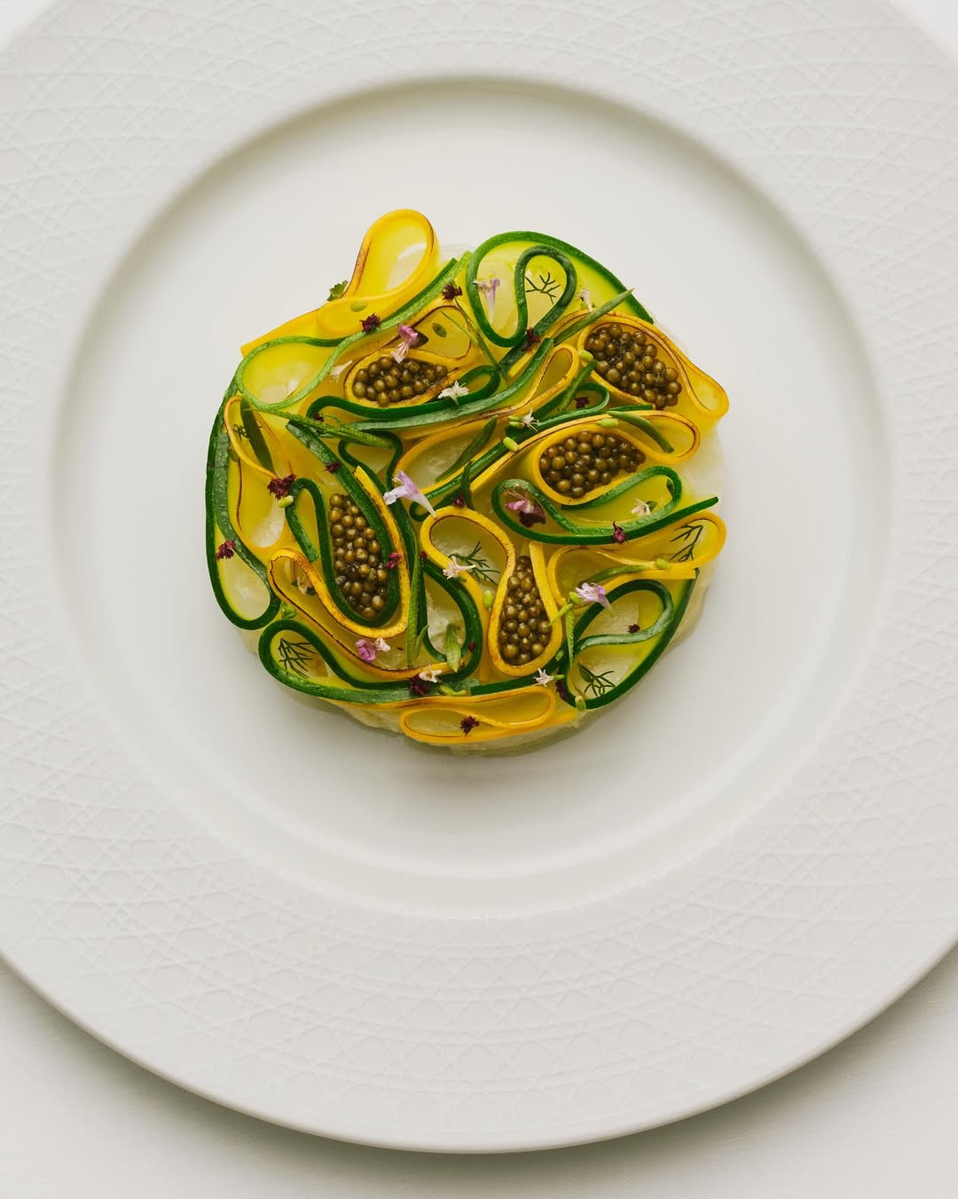 Michelin-starred Chef Anne-Sophie Pic has created a poetic menu inspired by the world of Dior, including iconic dishes Les Ganses and Pied-de-Poule, a delight for the eyes and the palate to be savored at the Monsieur Dior Restaurant in House of Dior Beijing