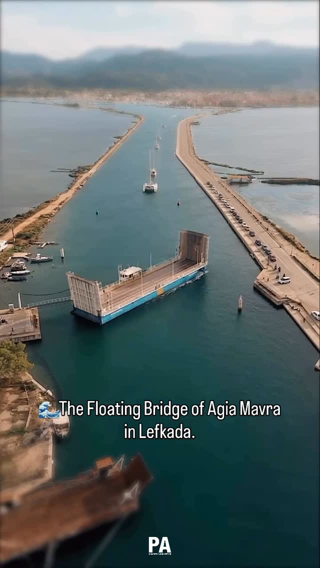 🌊The Floating Bridge of Agia Mavra in Lefkada is one of Greece’s most unusual infrastructural landmarks, a 500-meter pontoon structure that connects the island to the mainland by literally resting on the water. 

Completed in 1986, the bridge shifts gently with wind and tide, creating a dynamic threshold between land and lagoon. Its floating mechanism also allows small vessels to pass through, blending engineering logic with the calm landscape around the Agia Mavra Castle.

🎥 @left_berries

#Lefkada #FloatingBridge #PontoonBridge