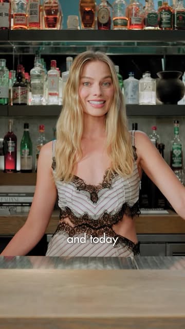 Before taking over Hollywood, #MargotRobbie used to work behind a bar – so when #BritishVogue tasked her with making cocktails inspired by her favourite films, it came quite naturally. Watch as she makes a Dark and Stormy while discussing acting alongside #JacobElordi, and the #WutheringHeights costumes that are “to die for”. Click the link in bio to watch the film in full.

Featuring: Margot Robbie
Director: @AlexandraGavillet
Director of Photography: @ZEzzeldine
Editors: @Evan.Allan & @Likachuu
Producer: @ChasedLewis
Stylist: @AndrewMukamal
Location: @EverlyHollywood

[Video Description: Video shows Margot Robbie behind a bar making cocktails, while wearing a striped sleeveless dress with black lace detailing and cut-outs at the waist.]