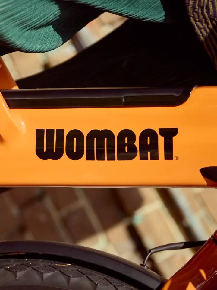 E-bikes are about more than transport. 

They’re about changing the way families move—sustainability meets fun.

Your brand must be friendly, robust, and reliable.
• This is the identity for Wombat Bikes, a new range of cargo e-bikes.
• Entirely Australian owned and designed, aimed at urban families.
• Identity by @primary.works . Client: @wombat_bikes 

How the design hits the mark:
• The custom logotype uses chunky forms and curves, evoking the Wombat namesake.
• The result is a mark that feels solid and strong, yet warm and approachable.
• A secondary mascot icon adds to the friendliness.
• The muted palette recalls the Australian bush, grounded in the brand’s origin.
• A pop of vibrant orange speaks to the brand’s energy and signature frame color.

It’s great to see these bikes now rolling through our cities.

Photography by @jacobboll and @dan_knott. Full case study live on the website.
#brandingdesign #brandidentity #ebikes #cargobike #primaryworks #wombatbikes #logodesign #australiandesign #designstrategy #visualidentity #sustainability