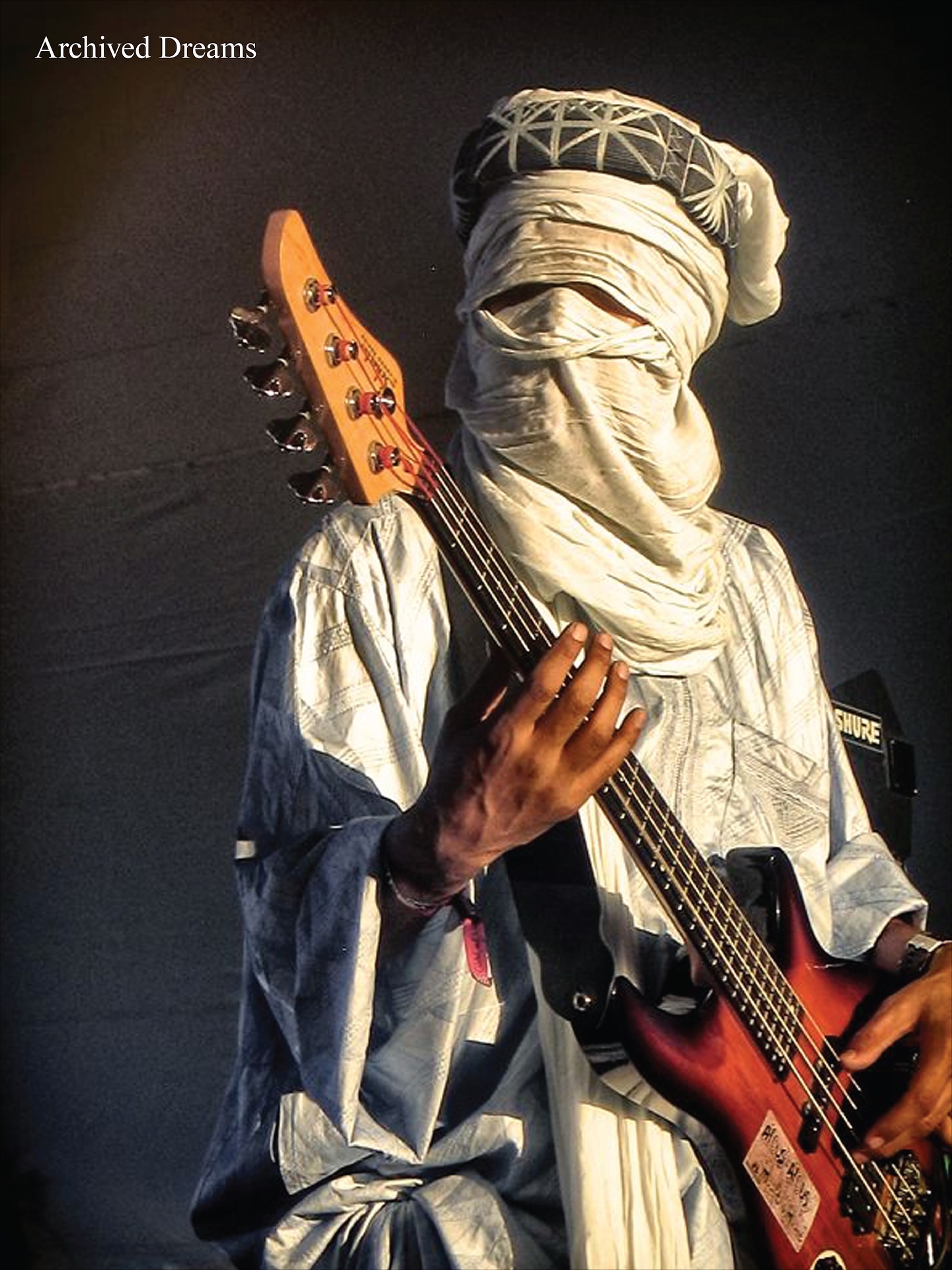 In the early 1980s, Tinariwen emerged as the unmistakable voice of the Tuareg people of the Sahara. 

Formed in the desert borderlands of Algeria and Mali, the band’s roots lie in a generation which at the time was displaced by drought, colonial borders and armed conflict. Their leader, Ibrahim Ag Alhabib, witnessed his father’s execution as part of the Tuareg rebellion, taught himself guitar in exile and helped forge the group’s identity. 

Tinariwen more than adapting traditional Tuareg music, electrified it, mixing roaring guitars, acoustic riffs and desert rhythms. The result is what many call “desert blues”: a genre grounded in longing, displacement and resistance. Their songs address exile, land, identity and freedom, a narrative rarely heard in Western music so candidly. 

By the early 2000s, they broke into international consciousness with the release of The Radio Tisdas Sessions (2001) and global tours. A Grammy win followed. But Tinariwen never simply became a “world music” export. They remain deeply anchored in the struggle of the Tuareg: their homeland’s hopes and wounds echo in every chord.

What are your thoughts? 💭