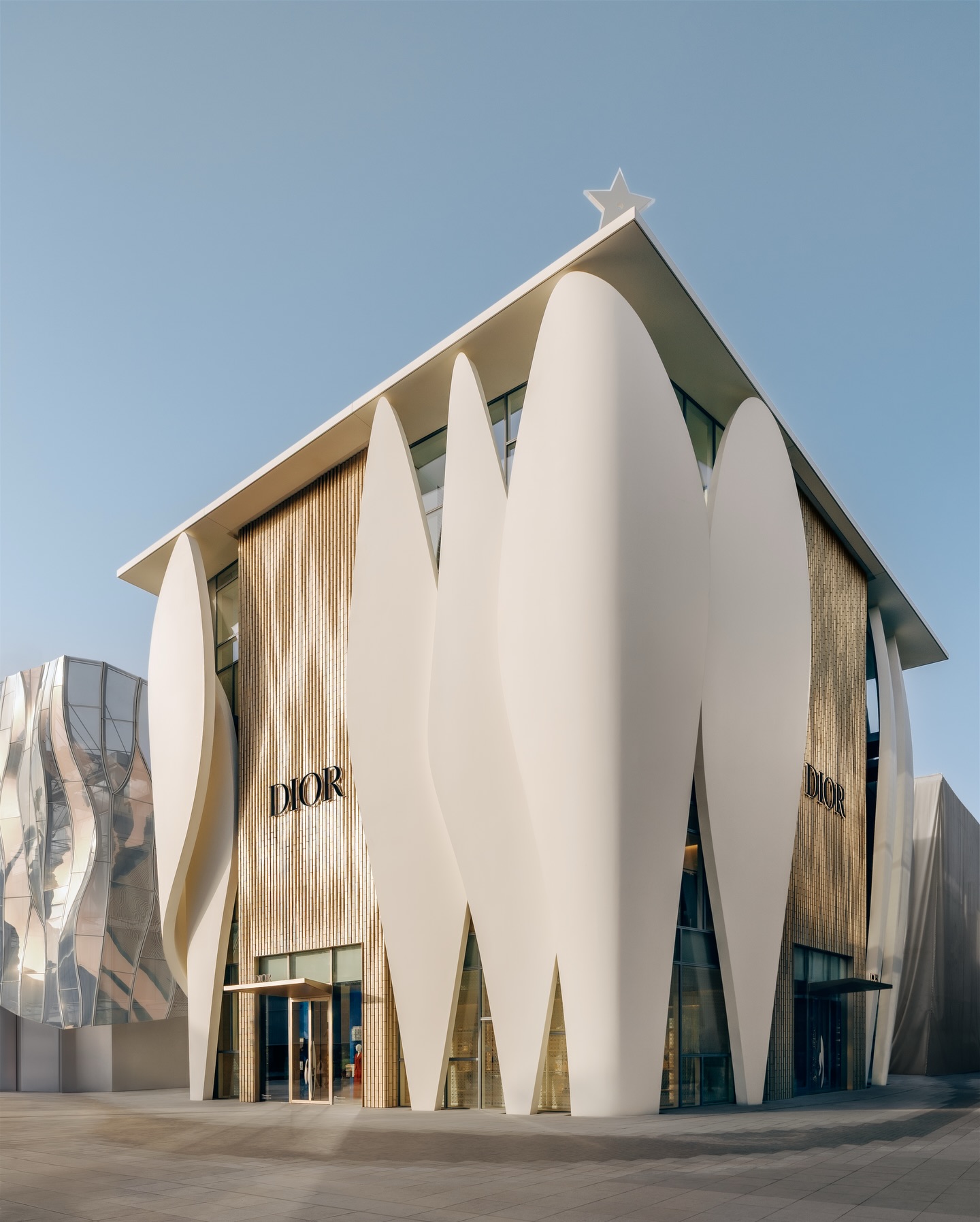 House of Dior Beijing marks its opening in Sanlitun with a celebration attended by Li Yunrui and Sun Anke in Dior by Jonathan Anderson, honoring the debut of China’s largest Dior address – a petal-like landmark designed by architect Christian de Portzamparc