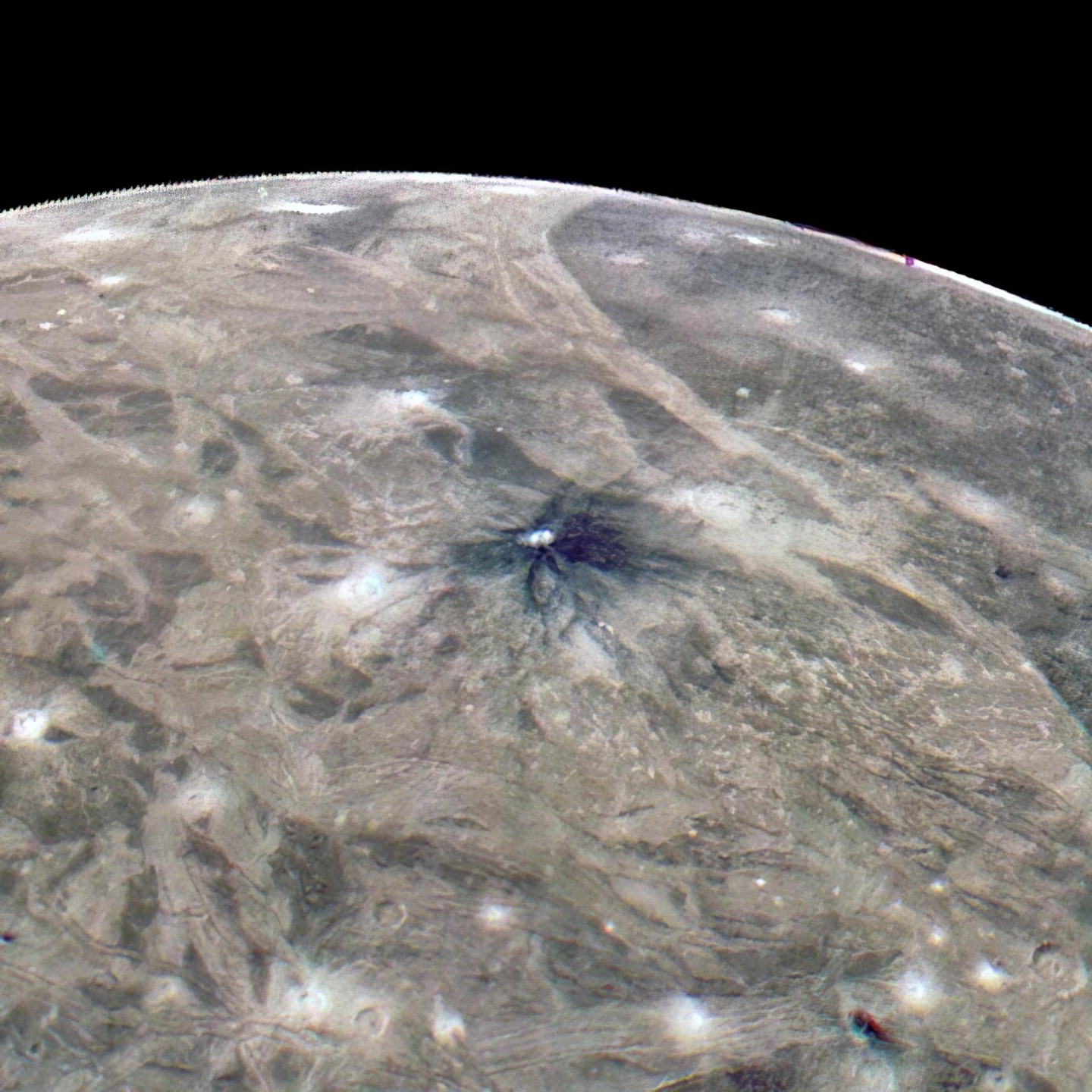 In this close flyby of Jupiter’s largest moon, Ganymede, our Juno spacecraft was able to capture this crisp photo of the moon’s surface.⁣

Ganymede is marked by multiple impact craters – most of which have white rays streaking out from them. However, a small percentage of impact scars are marked by dark rays instead, like streaks of charcoal. The dark crater named Kittu, shown here, is one example of these dark marks.⁣

Scientists believe that when dark craters occur, contaminants from the object that crashed into Ganymede are responsible for the darker debris. The dark material stays dark because it remains warmer than its surroundings, preventing ice from forming and turning it a lighter shade.⁣

Our Europa Clipper spacecraft, which launched in 2024, is on a mission to survey Europa, another one of Jupiter's moons—but not before passing by Ganymede in 2030. Ganymede might even serve as the spacecraft’s site of retirement, crashing into its surface at the end of its mission.⁣

Image description: The gray, streaky surface of Ganymede dominates the image, with a small amount of black space peeking out at the top of the image. The charcoal-black crater is in the center of the image, with sharp rays radiating out from the impact site. The rest of the surface is various shades of gray, dotted with white impact craters.⁣

Credit: NASA/JPL-Caltech/SwRI/MSSS Image processing by Thomas Thomopoulos © CC BY⁣

#Space #SolarSystem #Jupiter #Ganymede #JunoCam