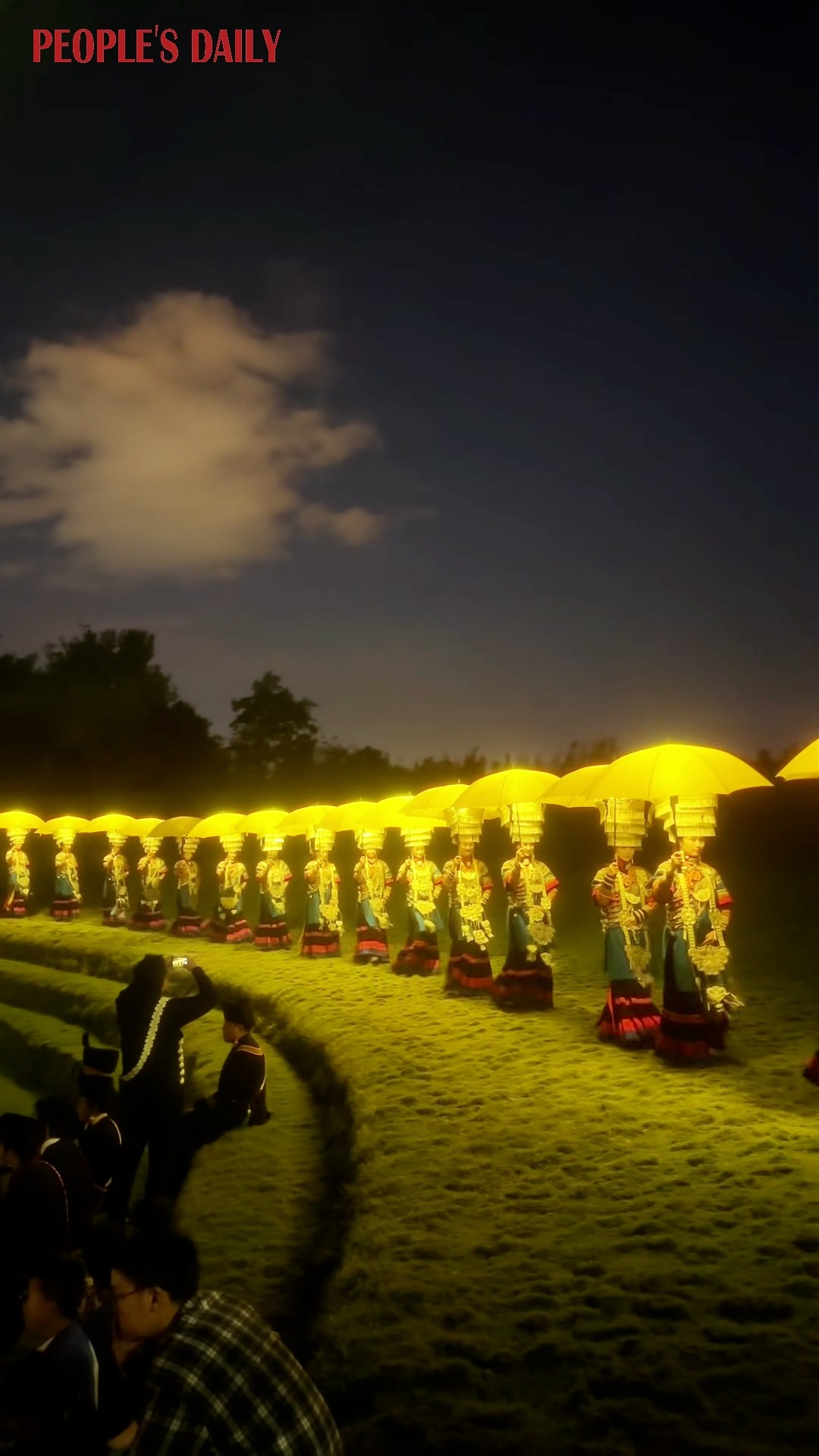 Glowing like #fireflies weaving a story into the night, a parade of performers in splendid Yi ethnic attire showcases the vibrant local #culture in southwest China’s Sichuan Province.