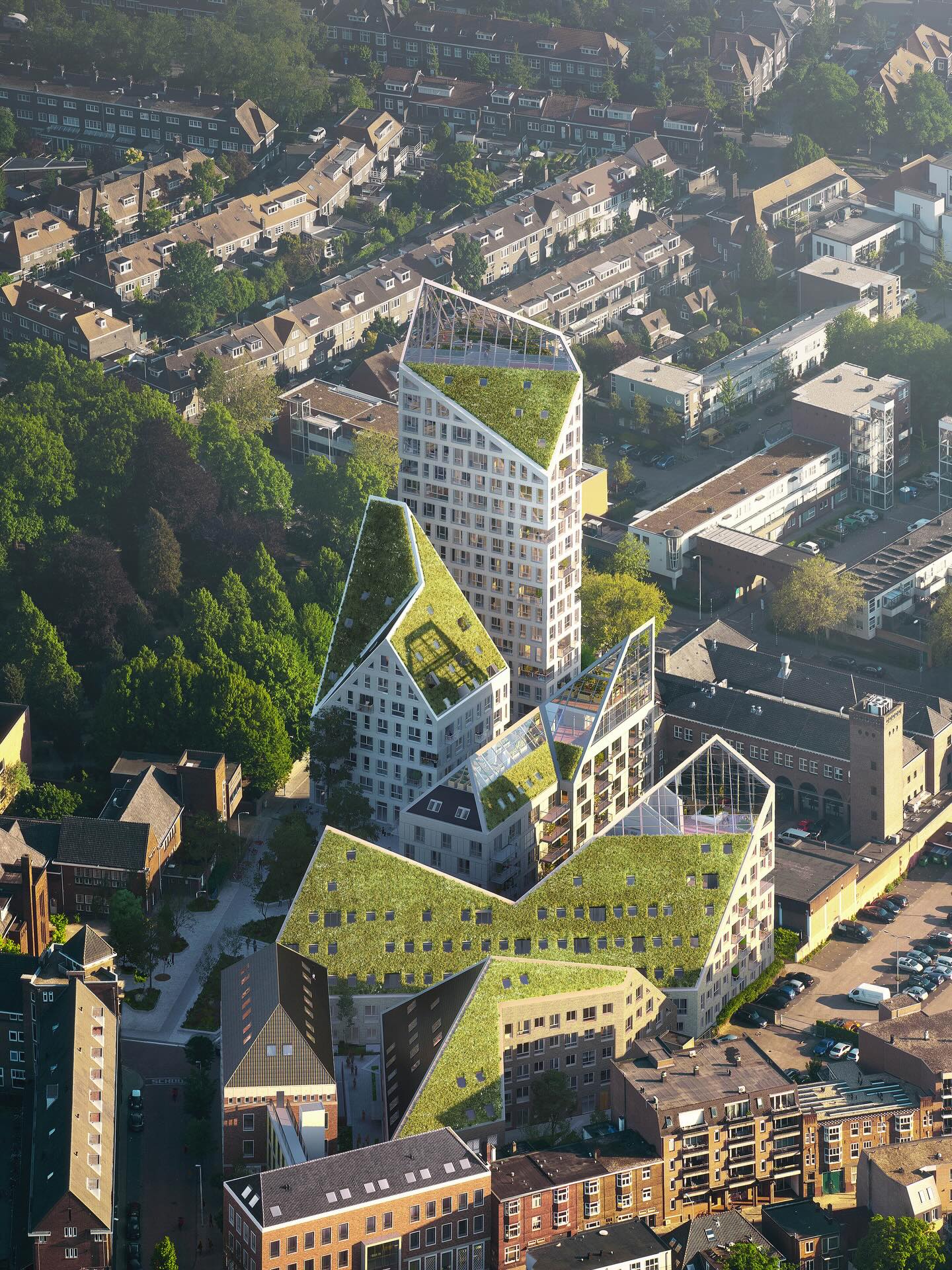 🏗️Nieuw Bergen, designed by @mvrdv, is a 29,000 m² development in Eindhoven’s De Bergen neighborhood. It includes seven buildings and offers 237 homes, commercial spaces, urban farming, and underground parking.

The design uses 45-degree sloping roofs to optimize sunlight and accommodate solar panels and green roofs. Historic structures are integrated with new constructions, maintaining the neighborhood’s character.

🌈The buildings, named after rainbow colors, include Indigo, the tallest, and Orange, which provides 48 social housing units. Features such as greenhouses, pocket parks, and textured facades emphasize sustainability and energy efficiency. 

👩‍🎓Join @thepaacademy’s workshops to learn from the industry’s best experts how to use advanced parametric design tools, AI in design workflows, and computational design in architecture!

#parametricarchitecture #parametricdesign #contemporarydesign #architecturaldetails #mvrdv