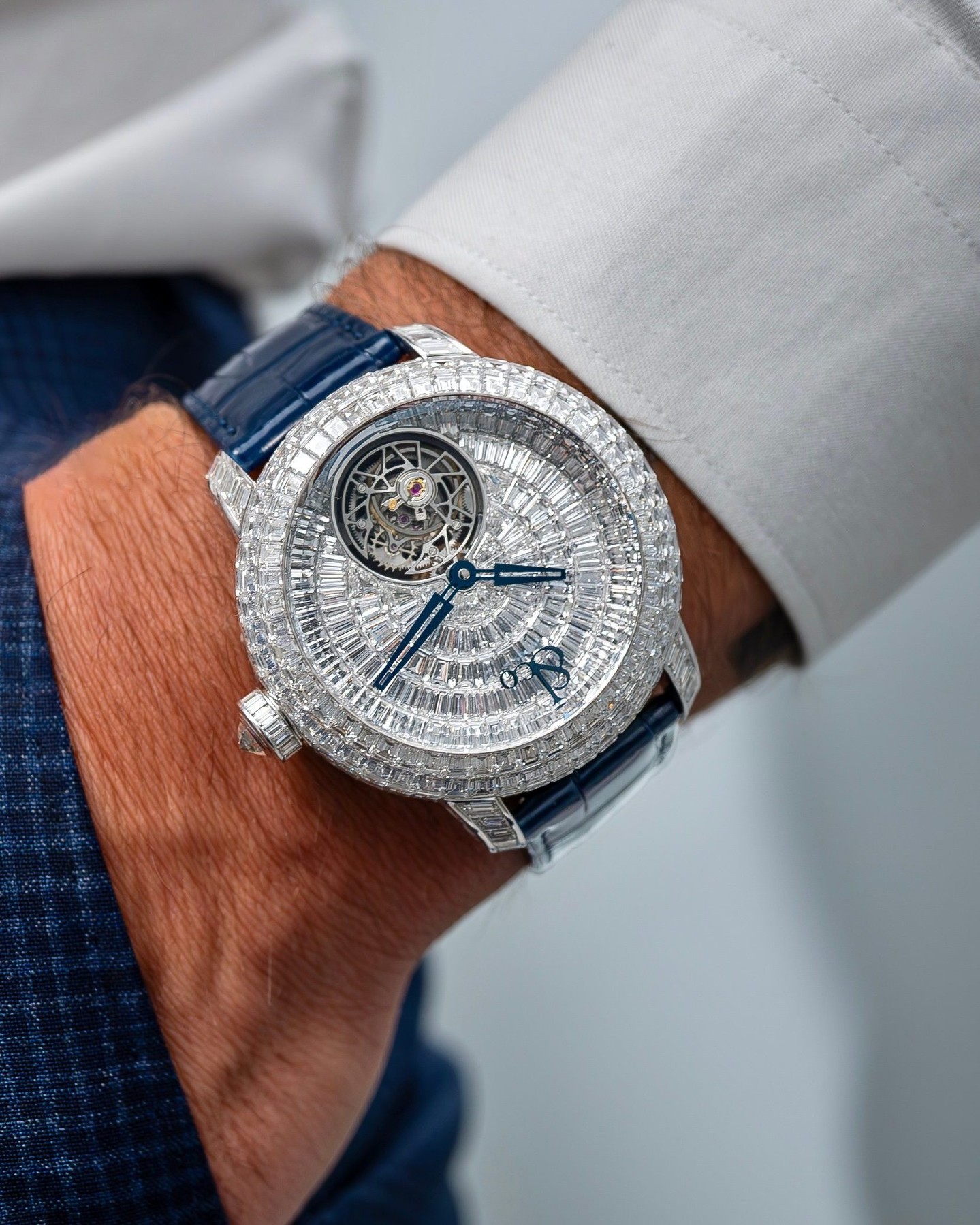 Luxury at every angle. The Jacob & Co. Caviar Tourbillon transforms the essence of high jewelry into a timepiece. A one-minute flying tourbillon beats at its heart, a masterpiece of high watchmaking and design.

47-mm white gold case
Invisibly-set with 373 baguette-cut white diamonds (29.5 ct.)
Self-winding movement set with 338 diamonds
Flying tourbillon

#jacobandco #InspiredByTheImpossible