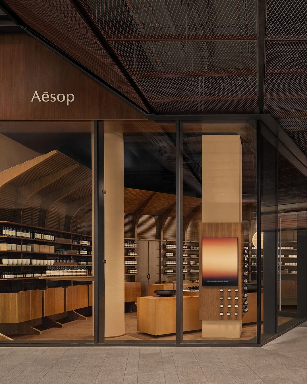 Conceived as an intimate drift between craft and commerce, the new Aesop store in Hamburg draws from the city’s maritime heritage to create a warm and sheltered interior world. Designed by the Aesop in-house team, the space translates the construction of traditional wooden boats into an enveloping atmosphere shaped by curved timber ribs, walnut and maple planks, and a textured oak floor that invites slow exploration. Just steps from the water in Überseequartier, the store evokes the quiet refuge of a cabin at sea while remaining connected to the social rhythm of the harbor city. Reused oxidized steel basins from the former Le Marais store and miniature raft-like pieces by Cigüe reinforce Aesop’s commitment to material longevity and design continuity, grounding the project in a narrative of craftsmanship, exchange, and a gentle sense of escape.

_project: Aesop Hamburg
_interiors: Aesop Design Team @aesop
_images: courtesy of Aesop
_location: Hamburg, Germany

——

@architecture_hunter is a non-traditional media that inspires, informs, and entertains a worldwide audience of over 3 million design enthusiasts.

🔎 get published: architecturehunter.com/register
🎥 watch & read: architecturehunter.com
🏆 follow: @architecture_hunter_awards
🏷️ tag #architecture_hunter to be hunted